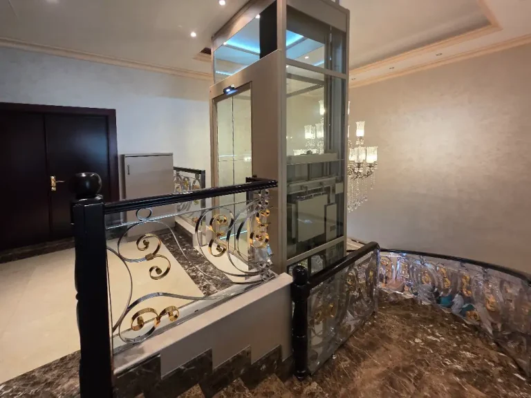 Glazed Cibes V80 Elegance lift shaft integrated with the staircase of a Dubai villa